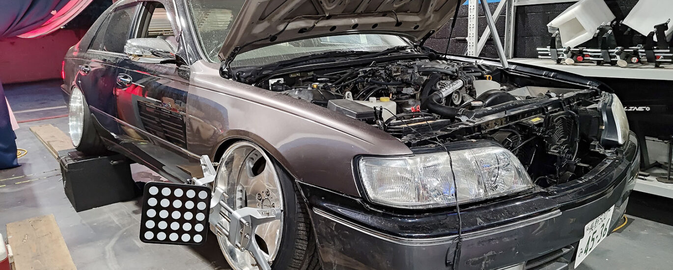 Jose's Nissan Cima on the Race Ramps for Alignment